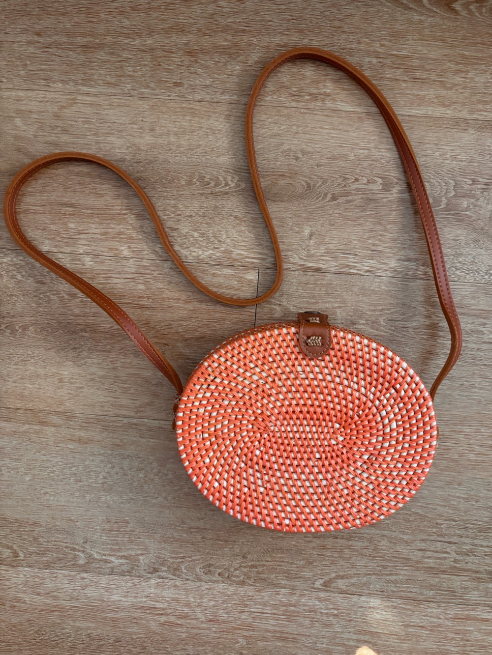 Round Woven Coral Crossbody Bag with Tan Strap